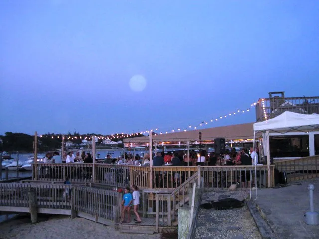 Evening crowd on the waterfront deck
