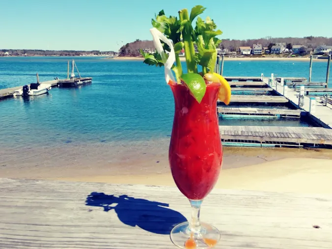 A Hurricane cocktail on the deck overlooking the dock and bay